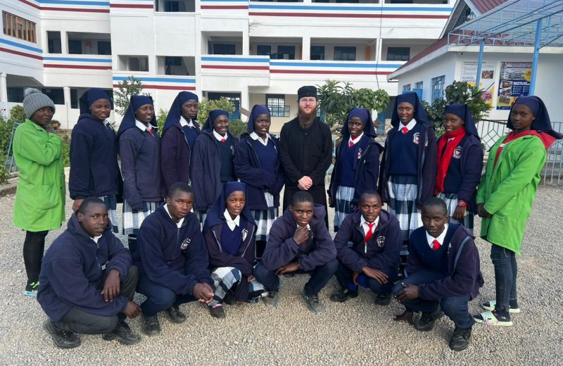 Visitors with high school students at St Barnabas